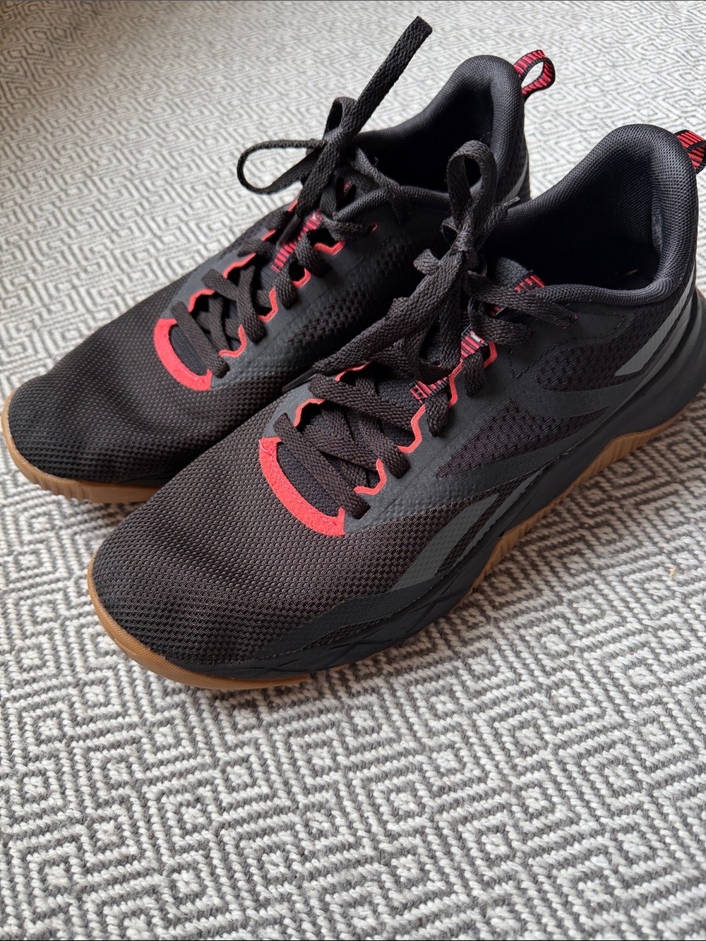 Reebok Men's Black Athletic Trainer with Red Accents